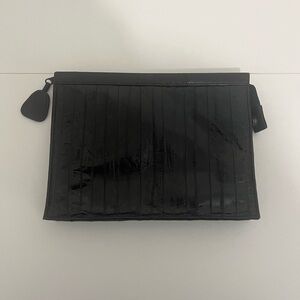 Black leather clutch